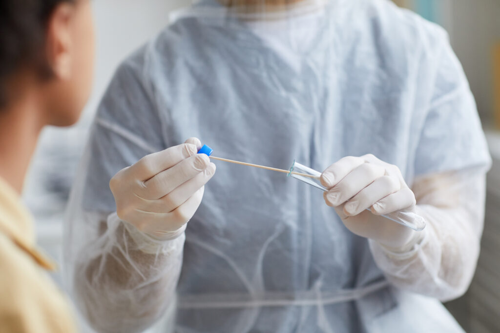 Doctor Taking Covid Test sample Closeup effect-of-covid-on-obesity